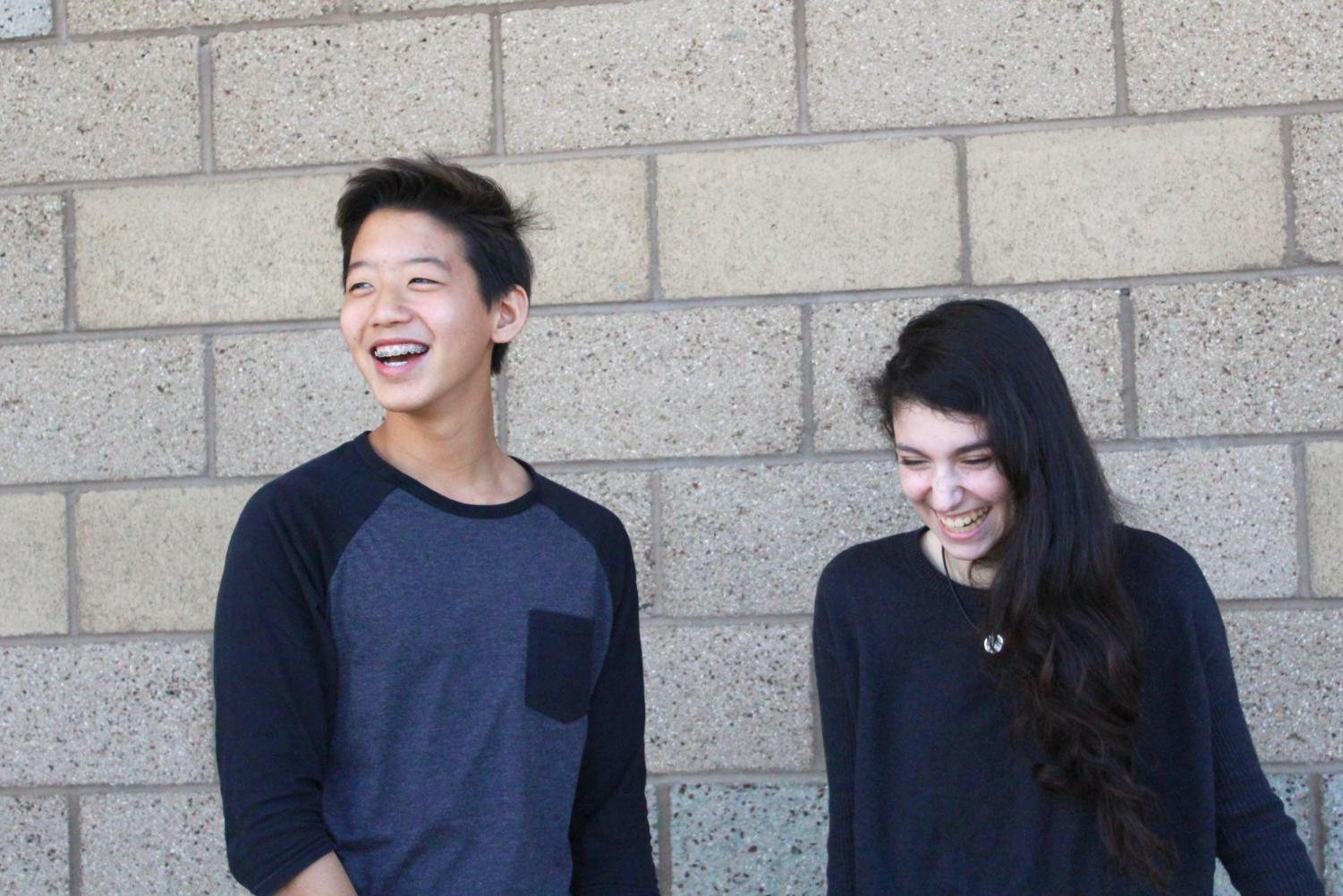 Freshman Jun Kim and sophomore Liz Moerman laugh as they relax during break; working together in both ASB and as co-anchors has strengthened their bond and friendship.