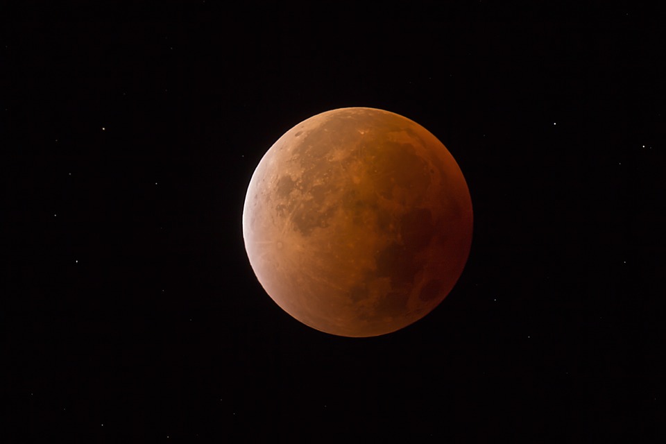 In addition to the red tint of the moon caused by the lunar eclipse, the elliptical orbit of the supermoon allows it to appear 14 percent larger and up to 30 percent brighter.