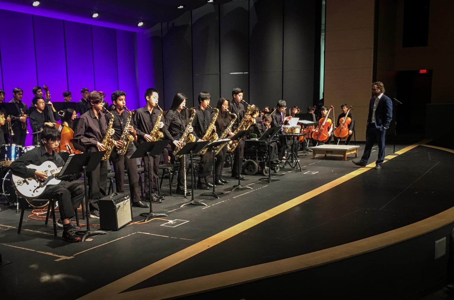 The saxaphones perform