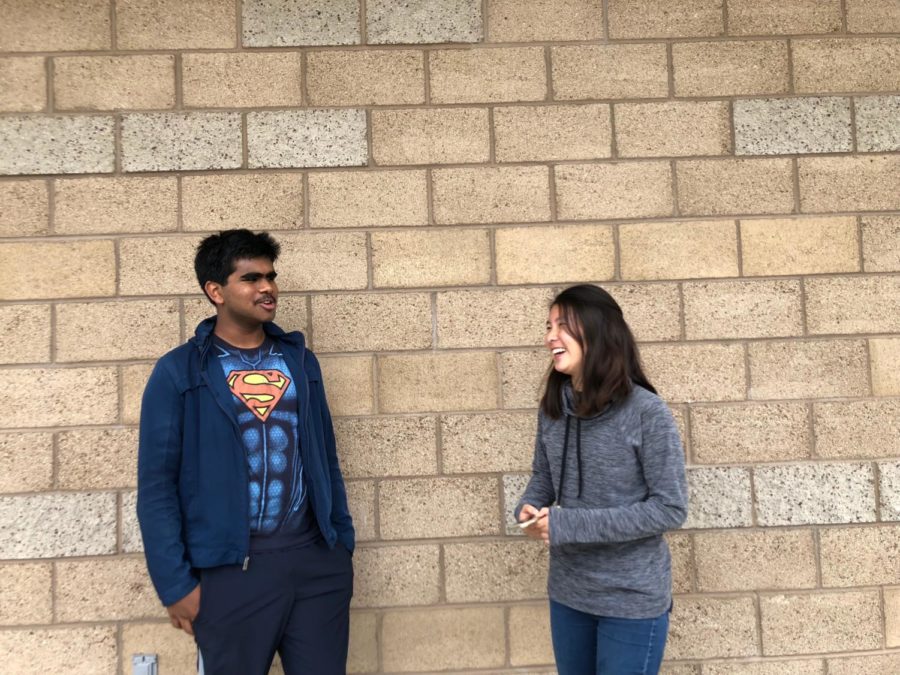 Sophomore+Nishad+Francis+and+freshman+Kate+Hayashi+share+a+laugh+as+they+discuss+their+differing+views+and+recap+on+the+year%E2%80%99s+memories.+