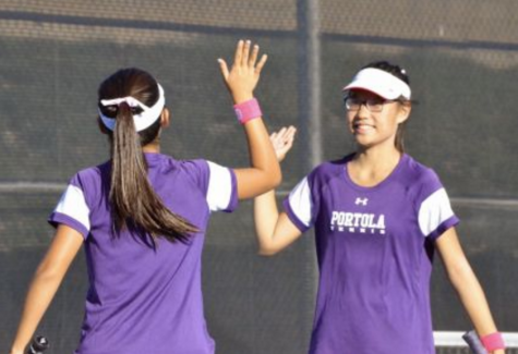 Doubles partners Kaylee Seo and Kelly Zhang celebrate after scoring a point.

