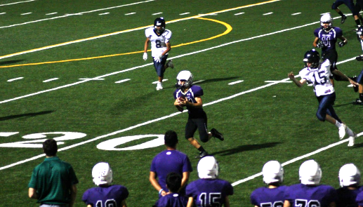 #24 running back Kai Horn gains yardage on a quick catch.