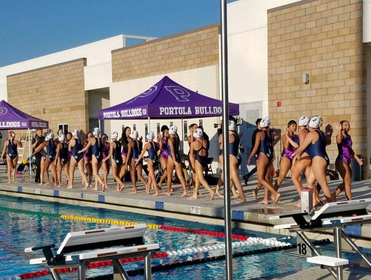 Portola+and+Northwood+High+water+polo+teams+line+up+after+the+game.