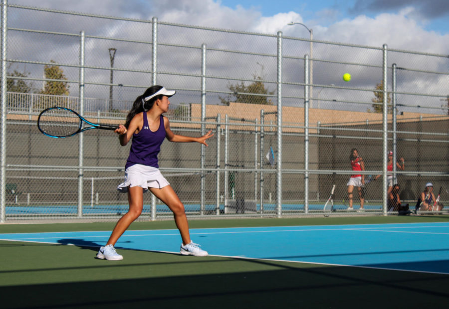 Sophomore Allison Shi returns a hit from her opponent.