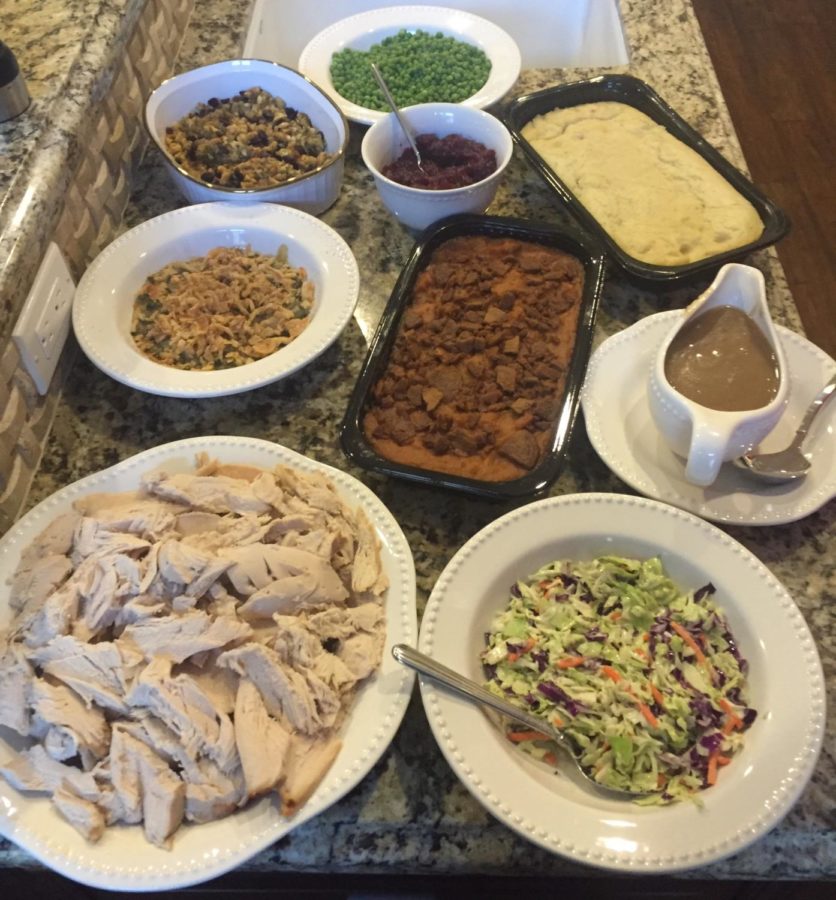 This is an example of a traditional American Thanksgiving dinner complete with turkey, mashed potatoes and gravy.