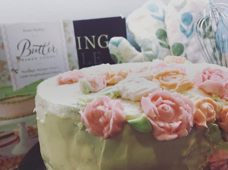 Freshman+and+baker+Kate+Hayashi+posted+her+white+buttercream+cake+adorned+with+roses+for+Instagram.+
