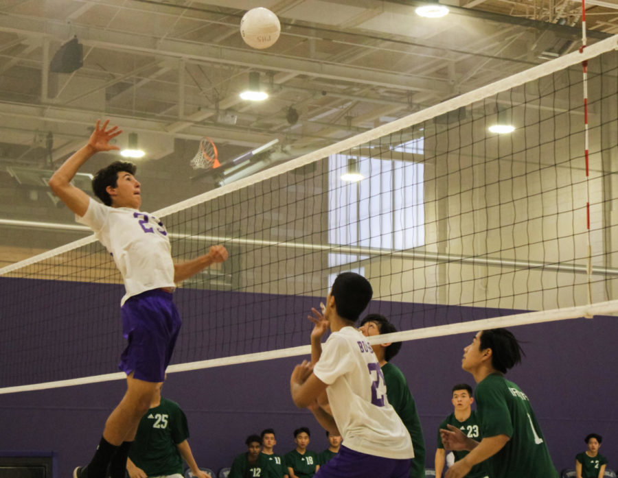 Kaveh Wojtowich returns the ball to the opponents with a spike and scores a point for the team.