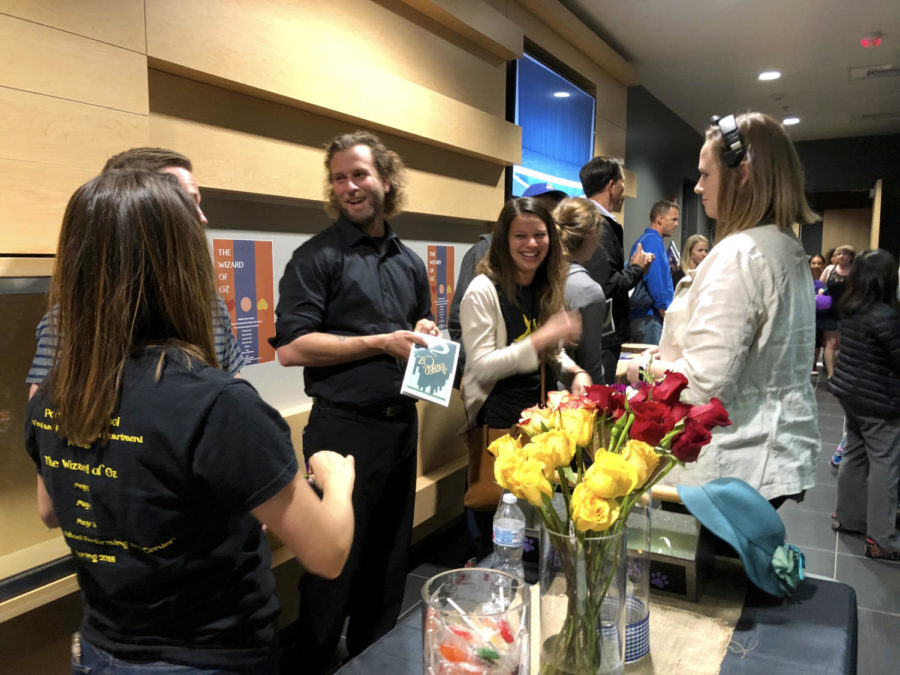 [From left to right] Samantha Gardner, Desmond Stevens, Emily Sheridan and Megan Kirby are in the lobby of the theater greeting parents who watched the show and congratulating the student cast on May 3 while enjoying the company of each other.
