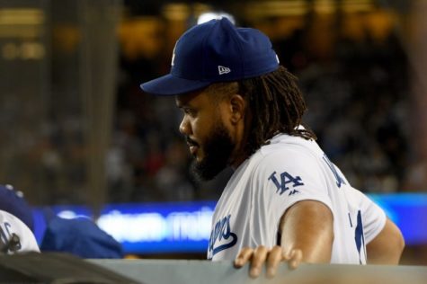 Dodgers closer Kenley Jansen (a strong pitcher who closes off the game to shut down the opposing team’s batting) watches the ninth inning of game five from the dugout, knowing that the team had lost. Jansen, along with the team, had not performed his best and was pulled out of many games early due to errors made.
