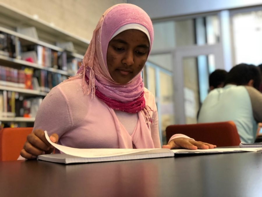 Sabreen studies for her AP Physics 1 class in the Student Union, working hard to maintain her demanding workload. In her free time, she also manages a Scratch program intended for third and sixth graders at Ardent Academy.