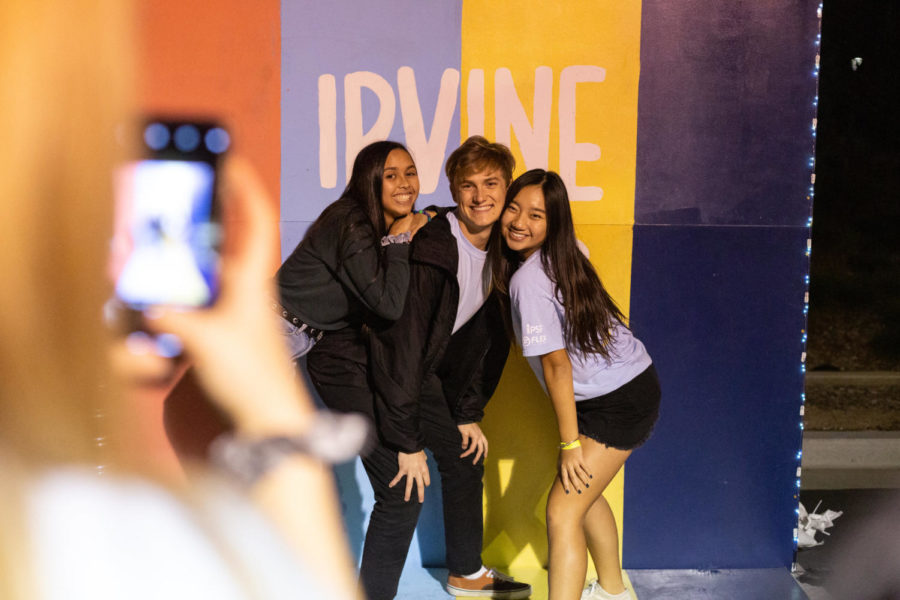 Students from other high schools attended Irvine Talks, laughing with their friends in front of an Irvine Talks backdrop during the first part of the evening.
