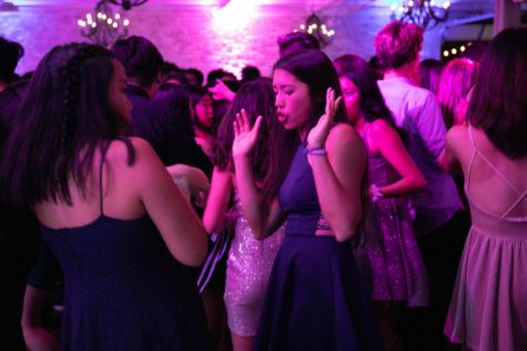 Sophomore Natalie Ng dances to hip hop music at the Fete. Over 500 students attended the dance, making it the most attended dance in school history. 