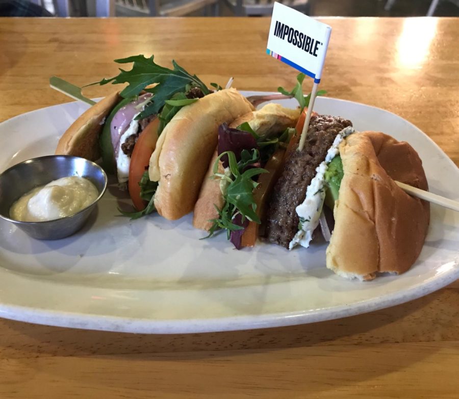 Aside from the actual patty, the Impossible Burger 2.0 was served with herbed goat cheese, organic mixed greens, grilled red onions, avocados, tomatoes and garlic aioli, all served on a brioche bun.