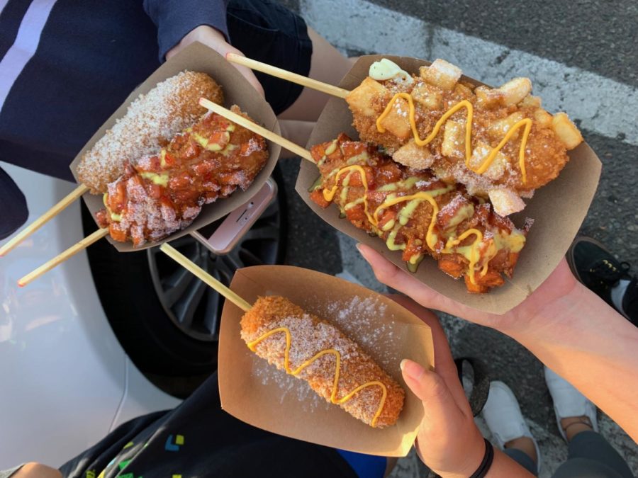 The picturesque nature of Chungchun’s sugar-coated corn dogs may attract newcomers interested in the Korean street food scene. Pictured are the all-mozzarella corn dogs, some on their own and others coated in potato or sweet potato chunks.