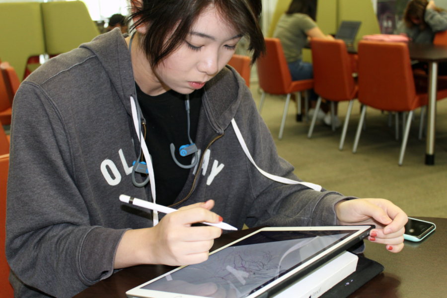 Digital drawing enables Hung to continue her pieces anywhere on the go, whether in the Learning Commons during lunch or after school at the local Panera Bread in Woodbury Town Center. 