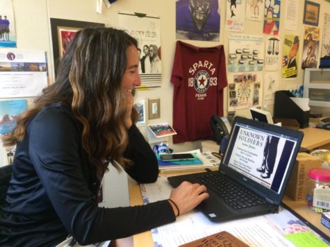 Social studies teacher Natasha Schottland reads through an online copy of Gardner Jackson’s magazine article “Unknown Soldiers.” Although some of the resources from the scholarship are in print form, all of the learning, including lectures from professors and communication with other teachers, occurs digitally. 