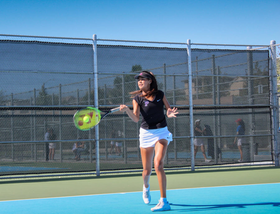 Anne Yang pounces on her opponents weak return, swiftly putting the ball away down the line. 
