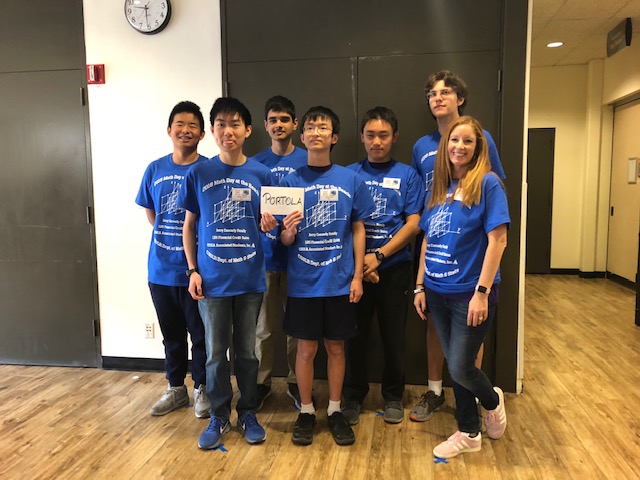 Club adviser Shelley Godett stands with (left to right) seniors Harry Song, William Hsieh, Nikhil Jha, junior Anthony Tan, seniors Joyee Chen and Nicholas Delianedis at the Math Day at the Beach competition. 