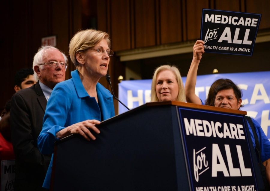 Sen. Elizabeth Warren, D-Mass., speaks on the platform of Medicare for All, which raises taxes for middle and upper-class, but brings the overall costs of affording healthcare down.
