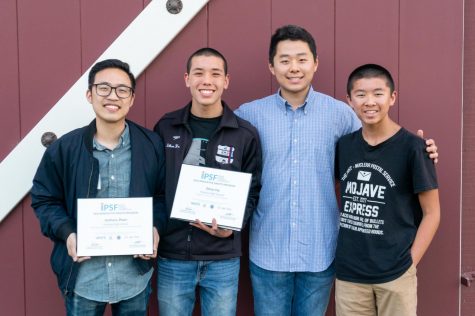 Teacher Anthony Pham, senior Benjamin Kim and junior Ethan Ho show the award for “Preparing Student-Athletes for the Next Competition: Esports.”
