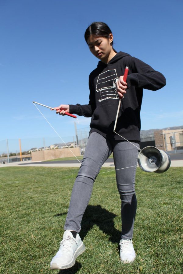After six years of passionate practice, sophomore Renee Wang can perform a variety of advanced tricks, such as vertical axis, one-handed whips and double yo-yo.