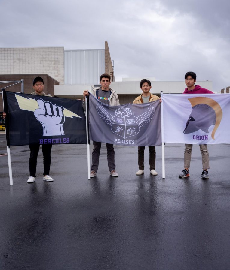 Sophomore Ryan Jung and seniors Kaveh Wojtowich, Matthew Vo and Taira Asakura hold their house flags as Portolas last house presidents before the transition to the class system.