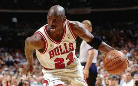 Chicago Bulls legend Michael Jordan drives toward the lane in a 1996 NBA Finals game. Jordan is widely considered the greatest basketball player of all time for his accomplishments, including six NBA Championships in eight seasons from 1991 to 1998, and his immense individual talent.