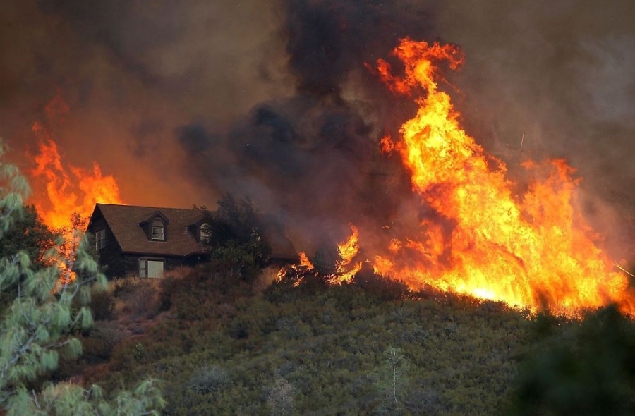 California’s dry climate nurtures forest fires. Homes surrounded by dry grass and bush are especially vulnerable to burning down.