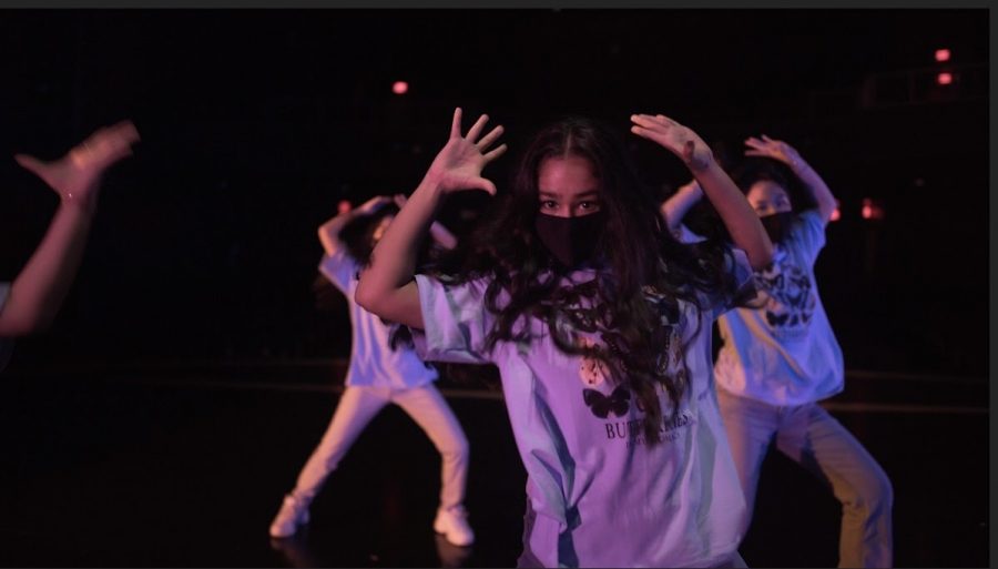 Senior Sonia Goyal and junior Amy Chen perform their socially-distanced number called Bola Rebola. All of Dance Company performed the same dance for the video pep rally, but in small groups of five to seven people. 