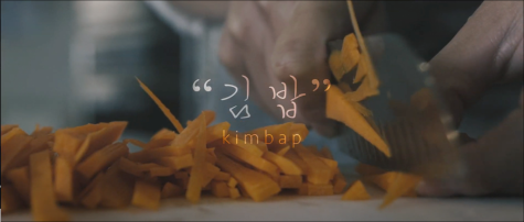  Senior and executive producer Angela Kim said that in order to capture crisp natural sounds in her footage, she placed the mic near the subject in action. In this shot, she filmed her mother chopping carrots, which will be an ingredient in making kimbap, a traditional Korean seaweed wrap.