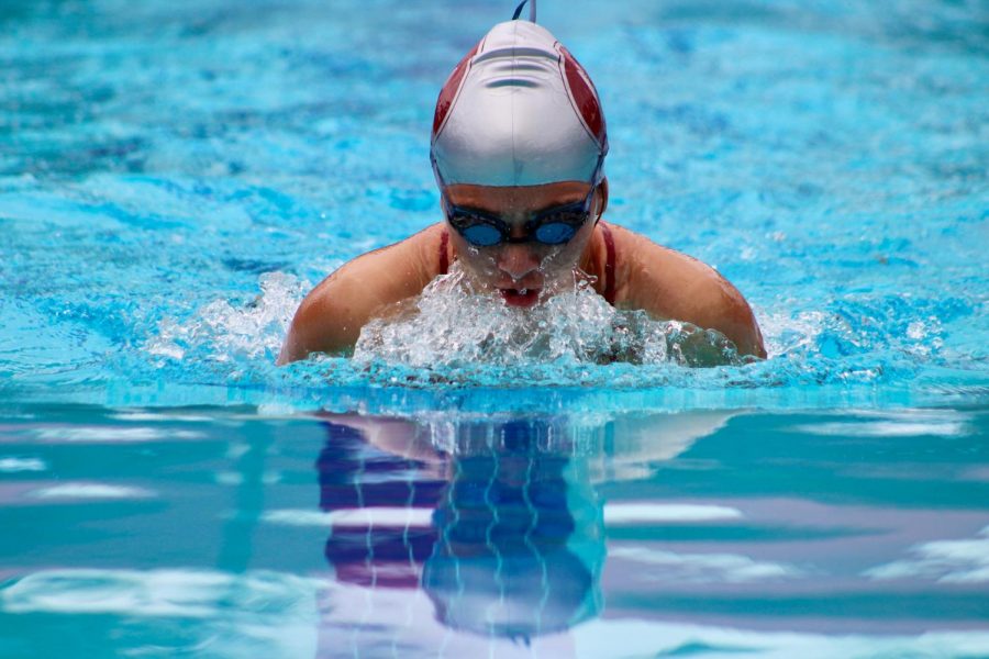 Senior Allison Kramer swims the breaststroke at a summer Irvine Swim League meet in 2019.