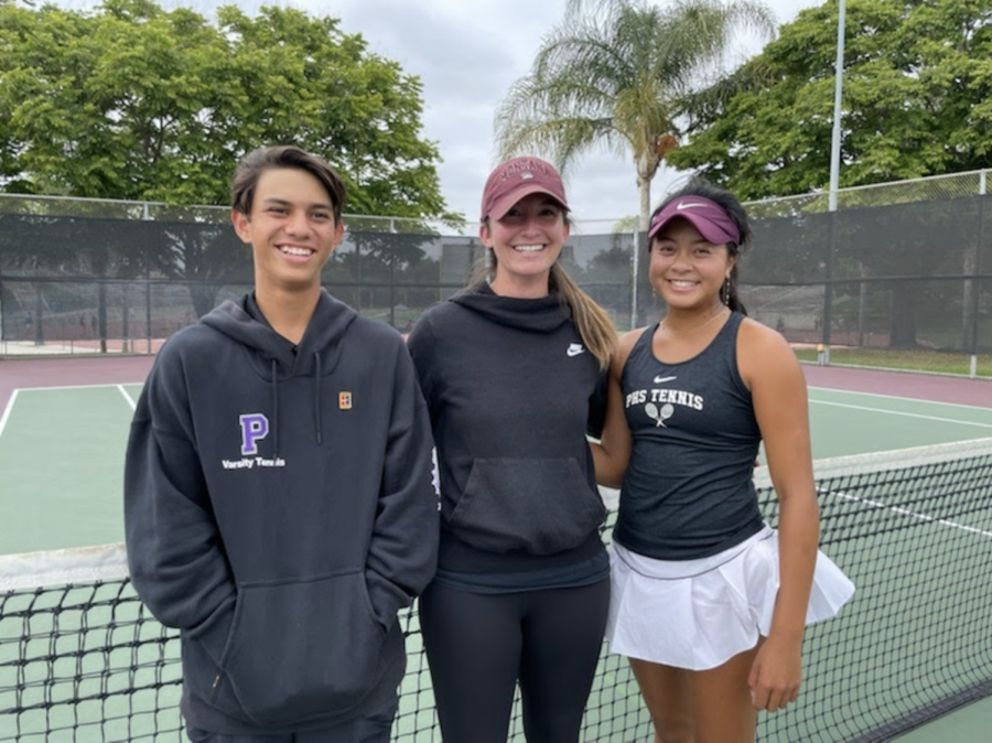 After winning their league titles, junior AJ Moore and sophomore Bella Chhiv posed in front of the net at Heritage Park with their head coach, Natasha Schottland. While league finals are typically held over the span of two days, Moore and Chhiv played on a compressed schedule, winning in their respective brackets on May 10.