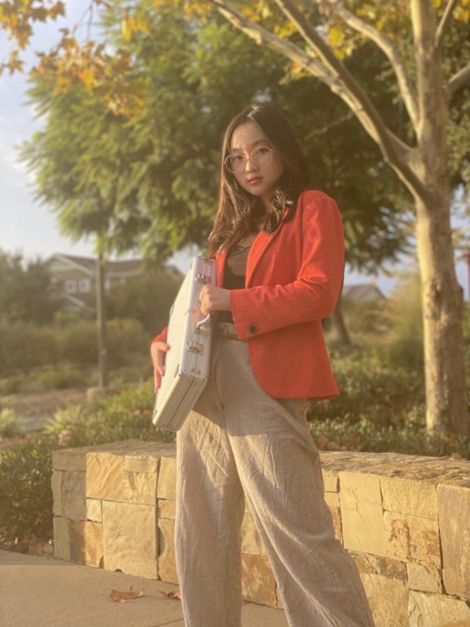 When former Portola High student Audrey Hsieh went thrifting at Goodwill, she was instantly attracted to this bright and bold red blazer. Pairing it with beige pants and a brown, braided belt, Hsieh decided to diverge from her regular dress attire to a less traditional ensemble.