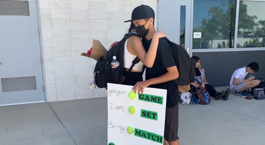 Sophomore Quinn Schatz asked sophomore Lisa Liu to Homecoming after second period and she was very excited to see that he took the time to cut up tennis balls for the proposal.