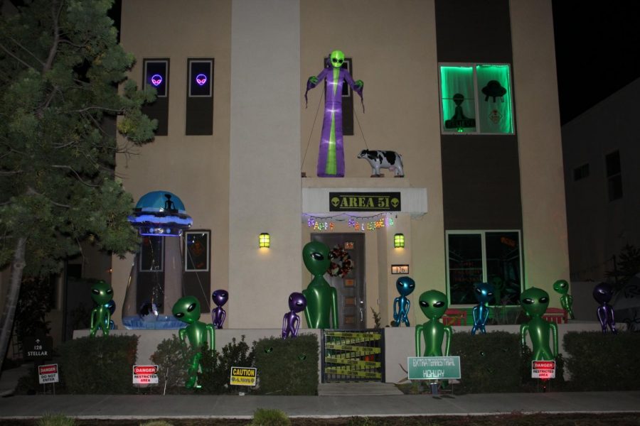 Freshman Mariana Alvarado-Rivera, junior Gustavo Alvarado-Rivera and their mother Rosana Rivera transform their house into an alien abduction site, using blow-up aliens and skeleton figures. The glow-in-the-dark stickers on the windows and bright lights placed above and near the house
illuminate the decorations even during the nighttime. 