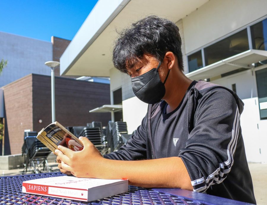 Sophomore Brian Kim reads “Mythology” by Edith Hamilton, a book that depicts Greek, Roman and Norse mythological stories. Kim said he used the book to gain insight into the opposing side of his stance and explore how the author portrayed the western stories. According to Kim, the book provided contrast he was able to reference when mentioning the portrayal of other non-western subjects such as how Buddhism spread to other cultures, a topic he explored in his research journal. He also referenced the book “Sapiens: A Brief History of Humankind” by Yuval Noah Harari to develop background knowledge on early human history, culture and religion.