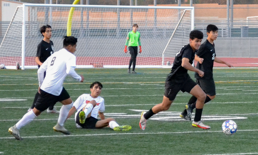 Forward and senior Parsa Goshtasbi wins the ball and looks to push it up the middle of the field and pressure the opponents’ defense. As the team’s forward, Goshtasbi scores goals and plays farther up the field to receive incoming passes from the wings and midfield to score. 