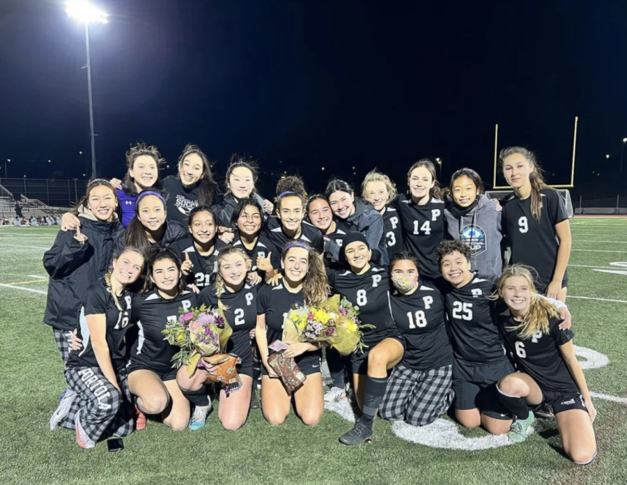 Girls’ soccer gathers after winning the game as Pacific Coast League champions for the 2022 season. The Bulldogs are the furthest into CIF in Portola High soccer history.