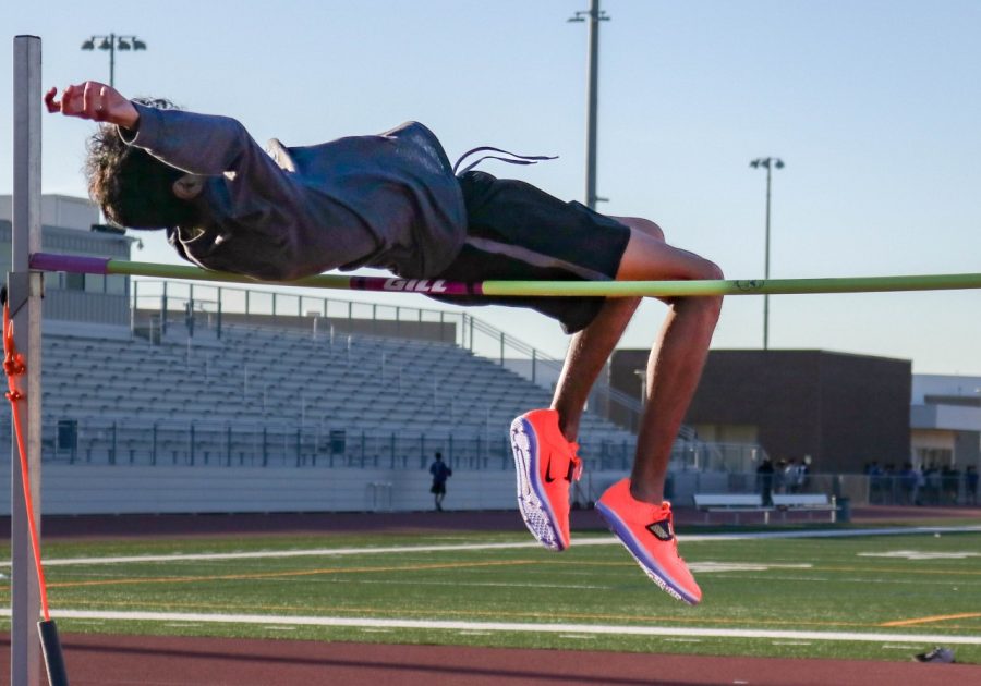 At the bar set to 6-foot-1, senior Aryan Shrivastava practiced solidifying his movement for a jump event that took place on Jan 29. During the event, Shrivastava jumped a personal record of 6-foot 5 and is expecting to compete again in a dual meet against Woodbridge High and Laguna Hills High on the track on March 1.