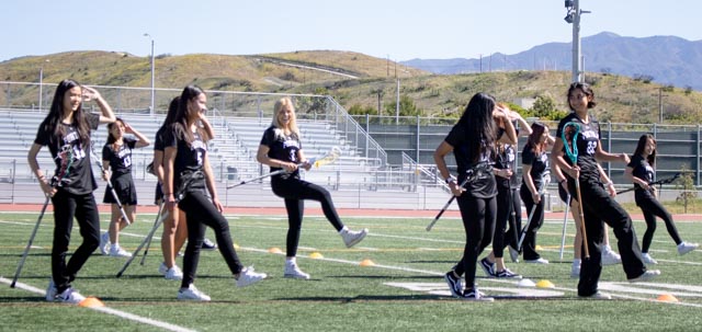 After the dodgeball tournament, girls’ lacrosse runs onto the field with their sticks and dances to a trending TikTok remix of “Drive You 2 (Jersey Club)” by rapper Retroj. 
