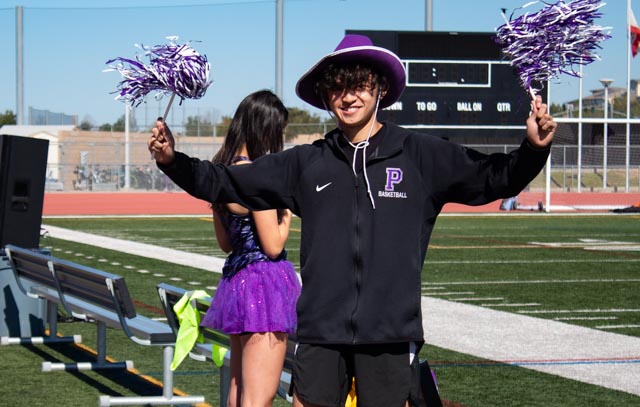 Athletics Boys’ Commissioner and junior Jayden Villanueva cheers on spring sports teams as they are announced and waves the pom-poms in front of the student body to commemorate the start of the new season.
