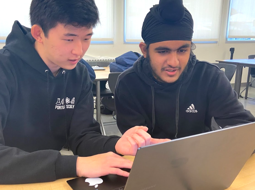 Junior David Kim and sophomore Arjit Singh collaborate on ASB’s activities for the next school year. In the next year, as ASB president and vice-president respectively, the pair will spearhead planning of school events and connect school administration with the student body. 