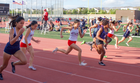 Juniors Alex Richmond and Janice Kim compete at the prelims 100m race. Kim finished at 14.05 seconds, and  Richmond finished at 12.45 seconds, D1 timing, according to live.athletic.net