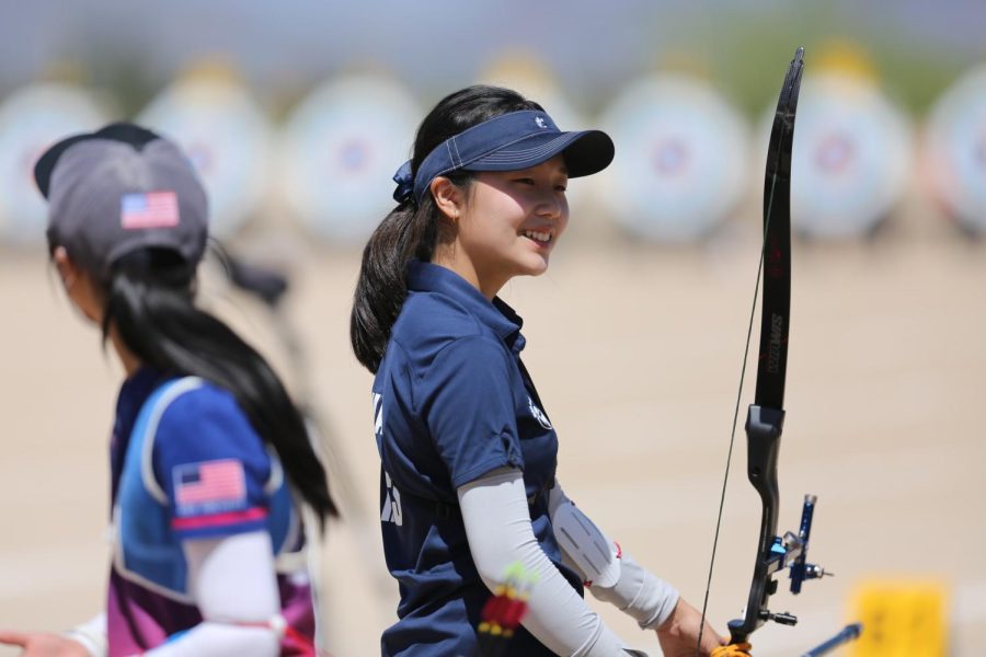Sophomore+Megumi+Chang+prepares+to+shoot+during+the+2022+USA+Archery+Junior+Olympic+Archery+Development+Target+Nationals+on+July+21.+Chang+said+her+interest+in+archery+sparked+at+9+or+10+years+old+after+she+watched+%E2%80%9CBrave%2C%E2%80%9D+a+storyline+surrounding+a+princess+named+Meredith+who+is+extremely+skilled+in+archery.+%E2%80%9CI+really+like+archery%2C+because+it+taught+me+resilience+and+discipline+and+responsibility+of+your+own+shots%2C%E2%80%9D+Chang+said.+%E2%80%9CSince+its+not+really+a+team+sport%2C+you+have+to+depend+on+yourself%2C+and+its+on+you.%E2%80%9D%0A%0A%28Photo+Courtesy+of+Megumi+Chang%29