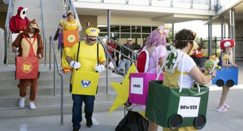 All fourteen teachers in the math department, styled as Mario Kart characters, drive themselves to a second consecutive victory in the costume contest after last year’s success. The Halloween costume contest is an important competition for the math department and takes many months to plan, according to math teacher Shelley Godett. “We started talking about it the first week of school,” Godett said. “Because everyone wants dibs on a good costume.”