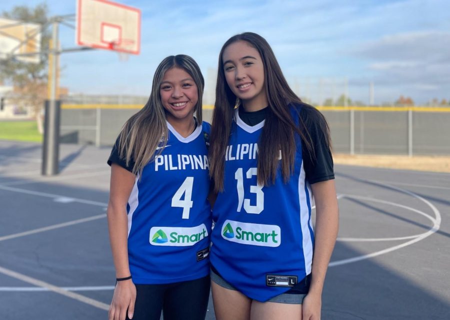 Juniors+Kalynne+Mendez+and+Emaleena+Elson+represent+their+Filipino+heritage+and+the+opportunity+to+play+in+an+international+basketball+tournament+through+the+team+jerseys.+Mendez+played+in+the+under-18+division+while+Elson+played+in+the+under-16+division.+