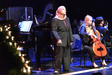 Sophomore and soloist Sara Haidar sings “Winter, Fire and Snow” by Brenden Graham with an accompaniment on cello from senior Juel Wettstein. The annual winter concert filled nearly every seat in the theater, according to choir director Adrian Rangel-Sanchez.