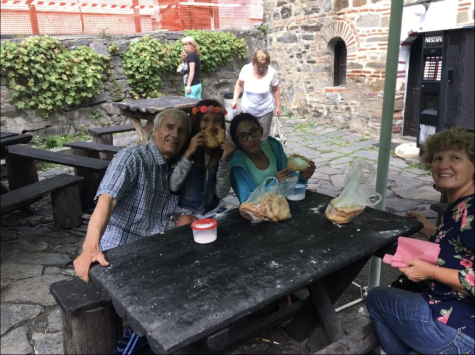 Junior Gabby Sarabosing eats sweets in Sofia, Bulgaria with her grandfather, grandmother and twin sister in 2017, six years before her grandfather was diagnosed with stage four lung cancer. According to Sarabosing, she has not visited Bulgaria since, but her mother went there to see her grandfather for two weeks in January. “My mom, even when she was in Bulgaria, was like, ‘I don’t want to send you pictures of him because you’re going to be so scared,’” Sarbaosing said. “‘He’s so different.’ So It’s just hard seeing him.”