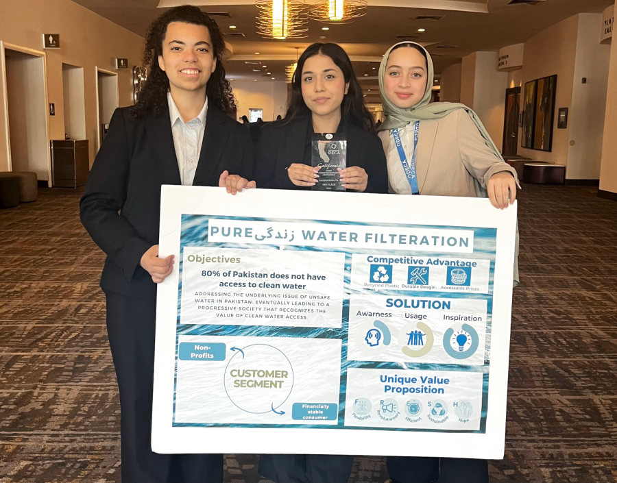 Juniors+Jasmine+Davis+and+Haniya+Hassan+and+senior+Jana+Malek+celebrate+their+win+on+qualifying+for+the+International+conference+with+their+project+about+pure+water+filtration+in+Pakistan.