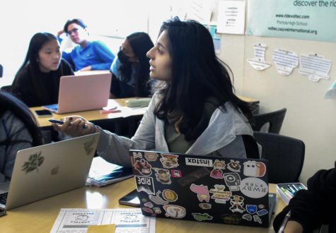 Junior SJ Janolkar prepares for the DECA state competition with fellow Business Club members. After winning district vice president through a lengthy application and election process, Janolkar will be inaugurated at DECA state, which takes place March 3-6.